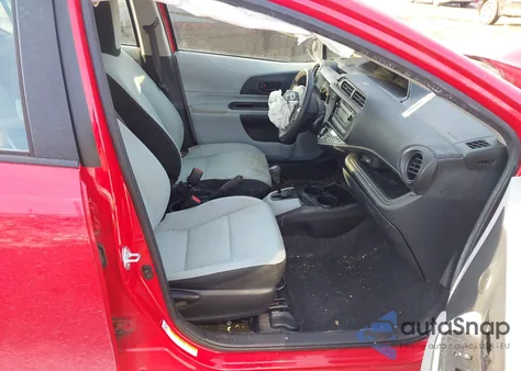 2014 Toyota Prius C One from USA, damaged, VIN JTDKDTB30E1072176